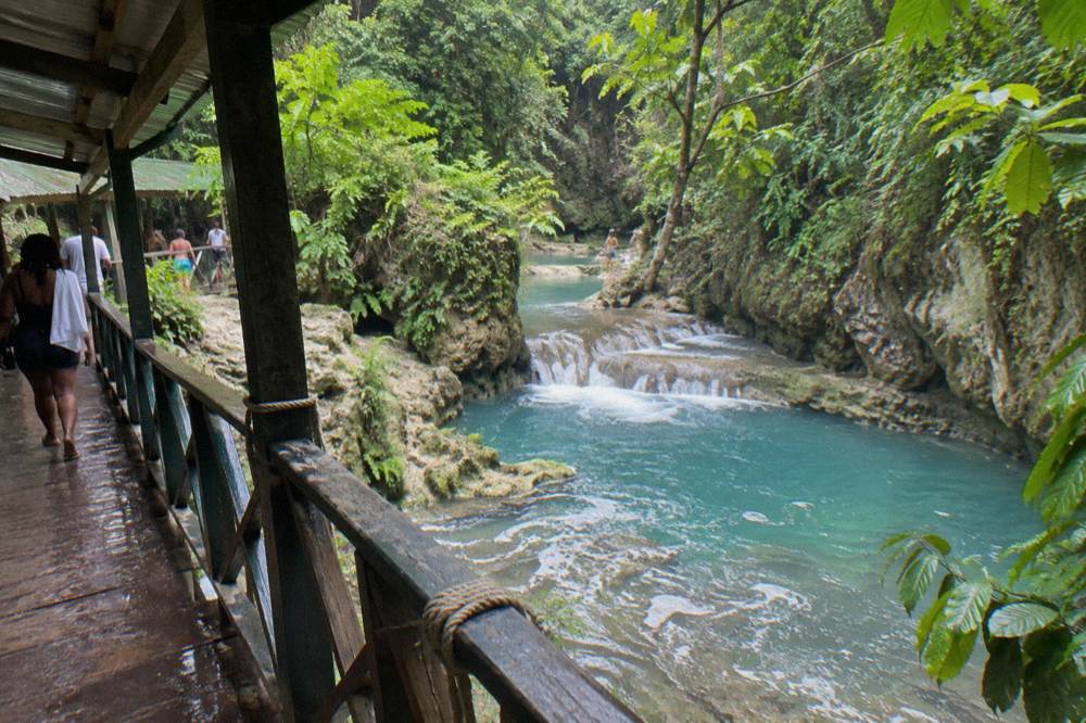 Rainforest limestone gorge with turquoise river pools