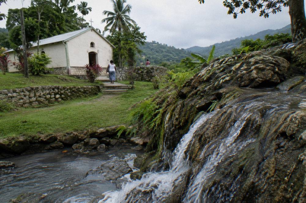 Small hillside chapel and grounds at a quiet countryside heritage site in Jamaica