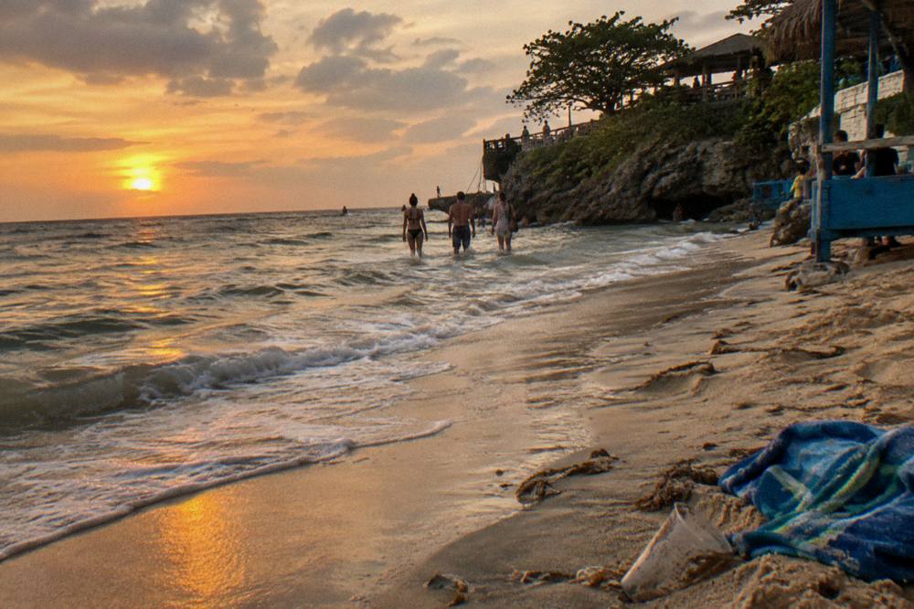 Sunset over the coastline near Negril after a full day trip along Jamaica's north coast